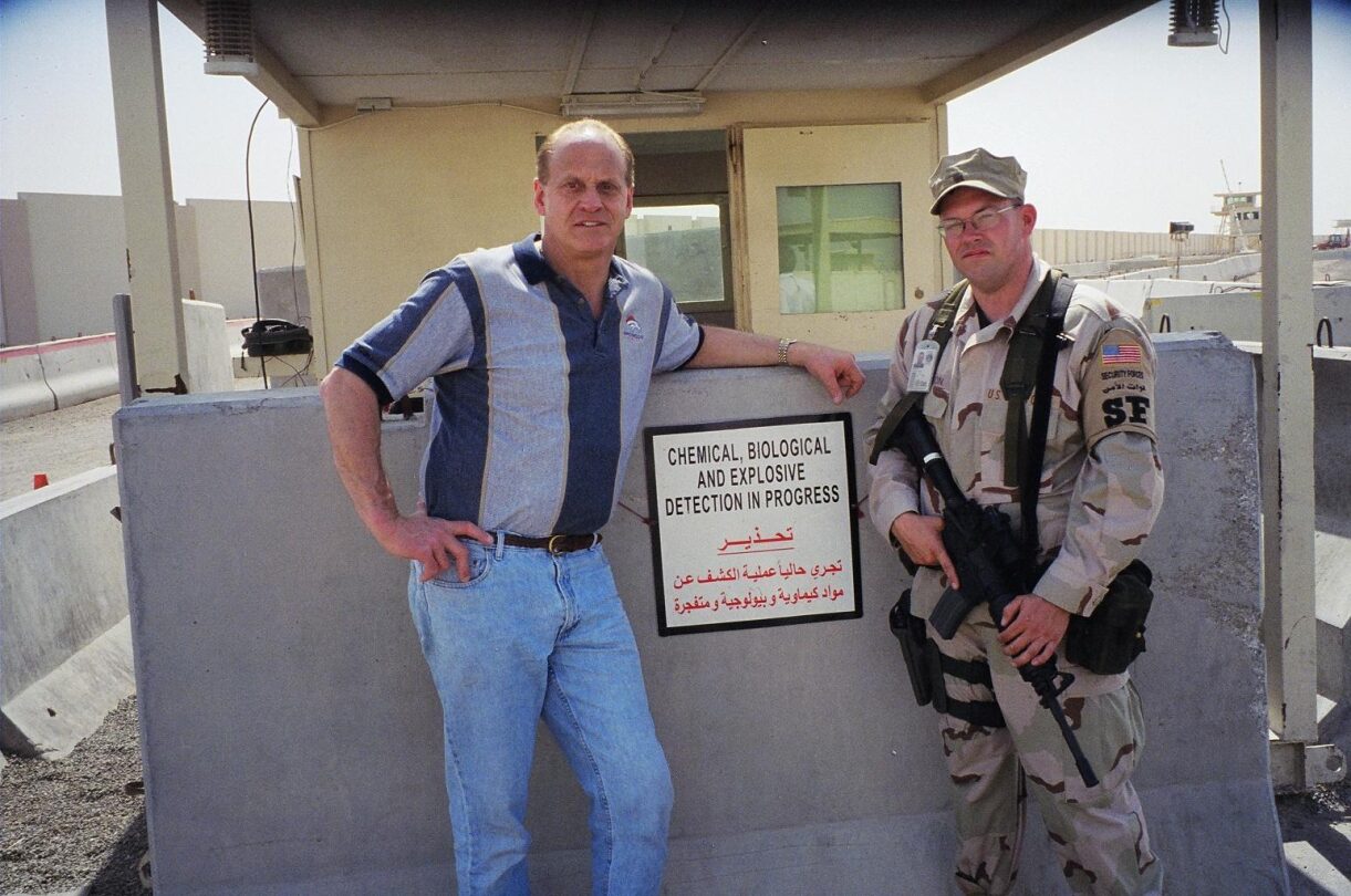Randy Gradishar with military personal in uniform